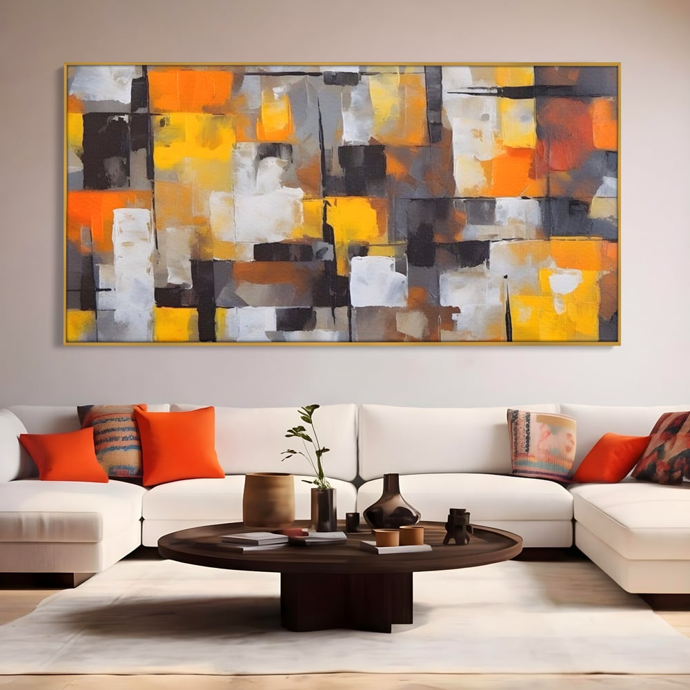 Tablou canvas cu tablou canvas cu patrate abstracte, in rama de aluminiu auriu, pe perete intr-un living